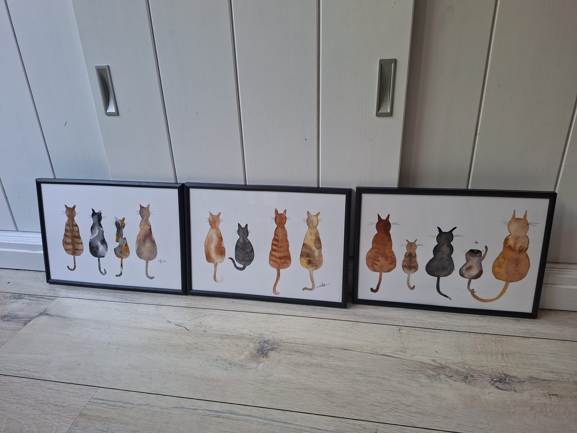 Drie verschillende ingelijste aquarellen van kattenvrienden, gemaakt tijdens de workshop